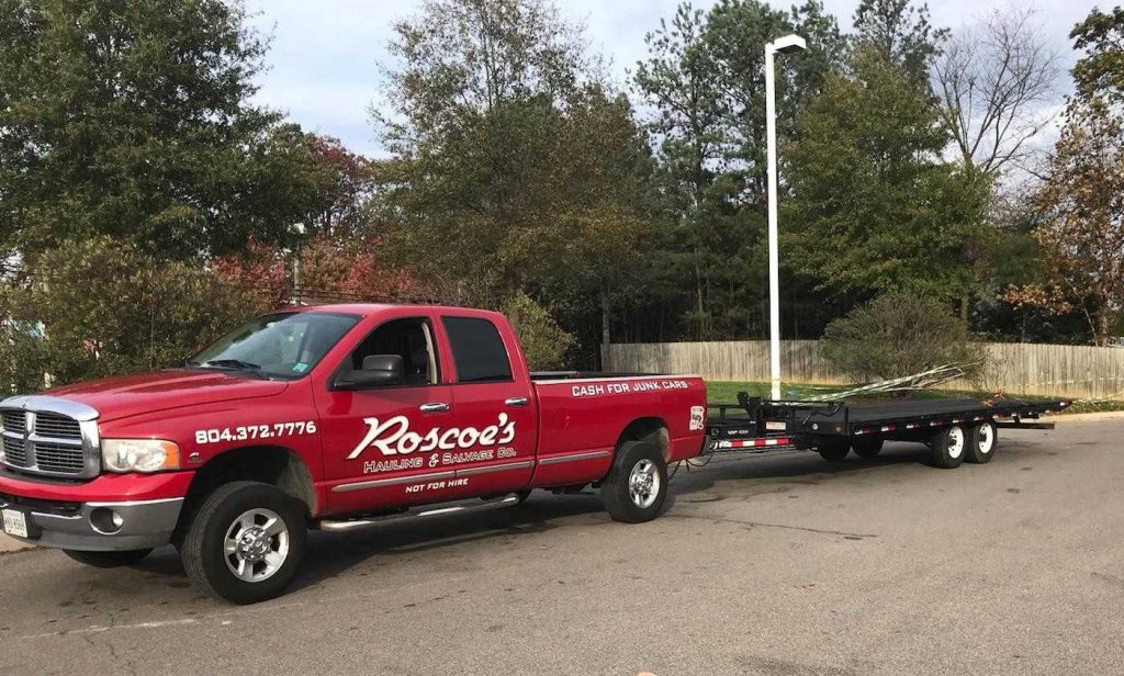 dodge ram with pg tilt deck trailer at the ashland christmas parade